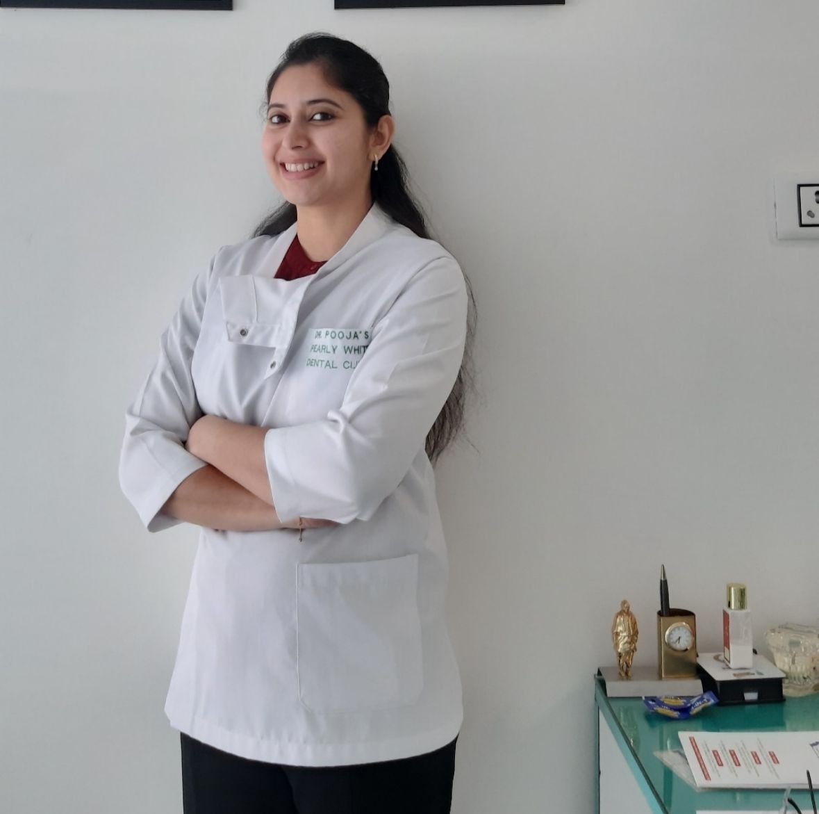 Dr. Pooja — Pearly White Dental Clinic Indore